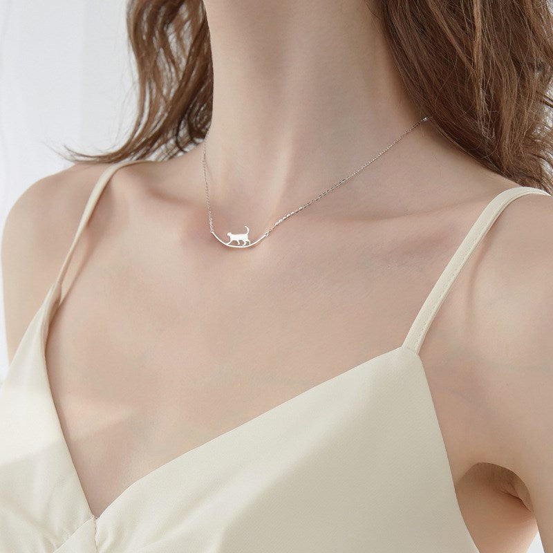 S925 silver necklace with a unique curved cat-shaped pendant.