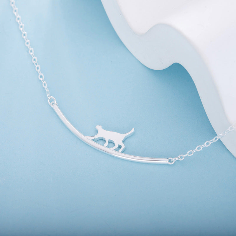 S925 silver necklace with a unique curved cat-shaped pendant.