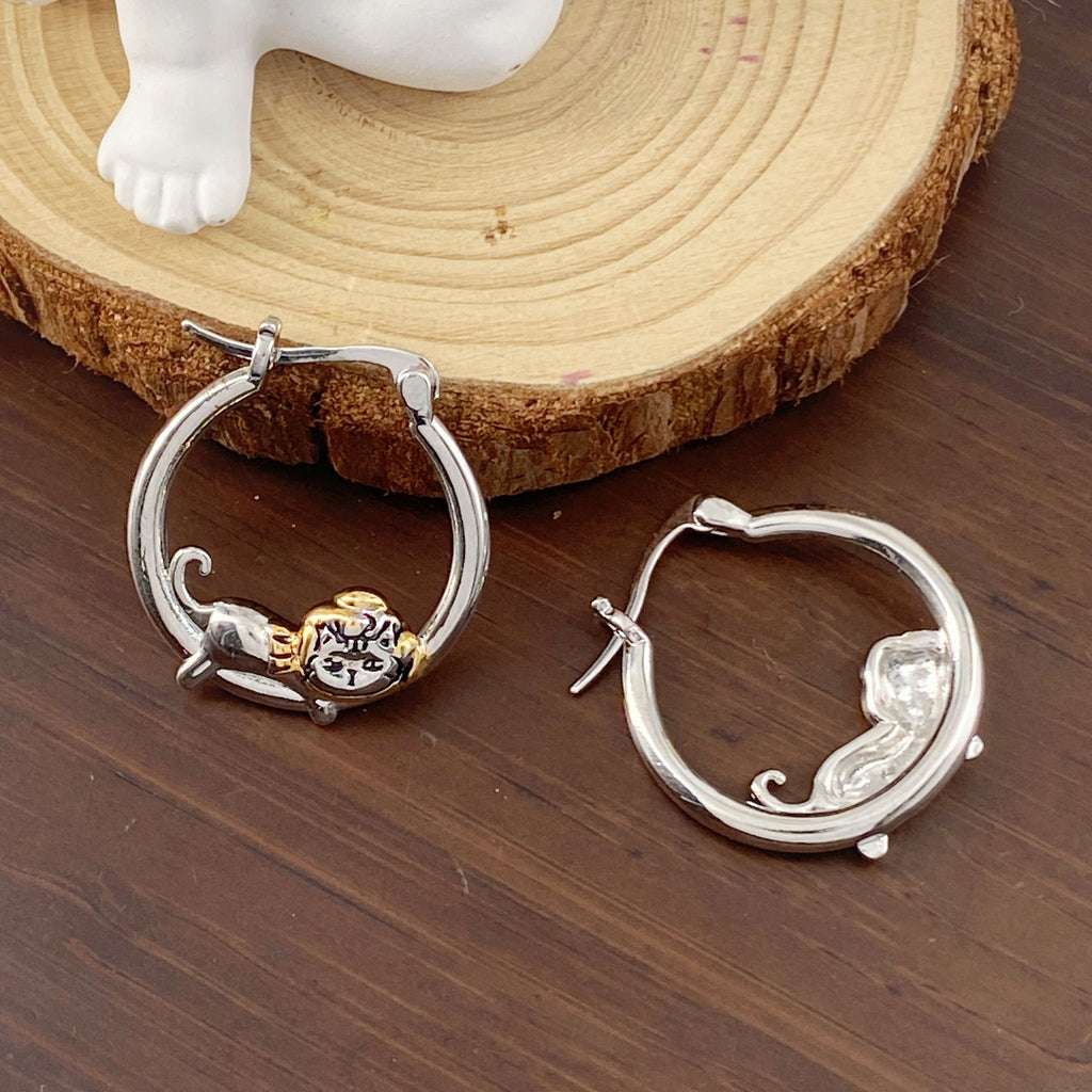 Stylish round cat-themed earrings