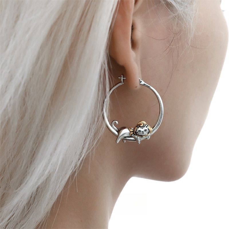 Stylish round cat-themed earrings