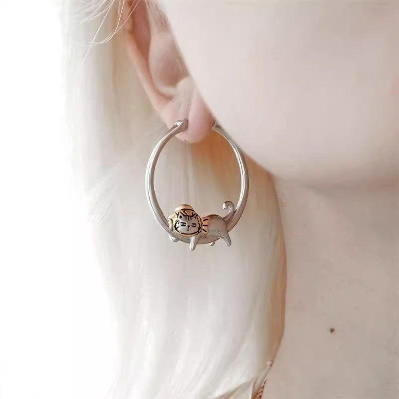 Stylish round cat-themed earrings