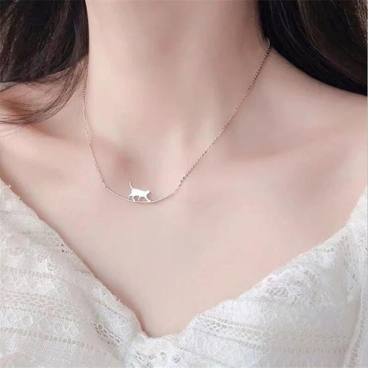 S925 silver necklace with a unique curved cat-shaped pendant.