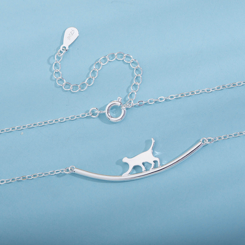 S925 silver necklace with a unique curved cat-shaped pendant.