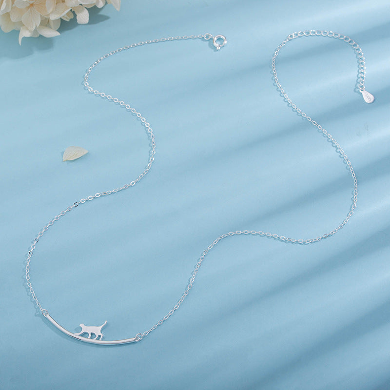 S925 silver necklace with a unique curved cat-shaped pendant.