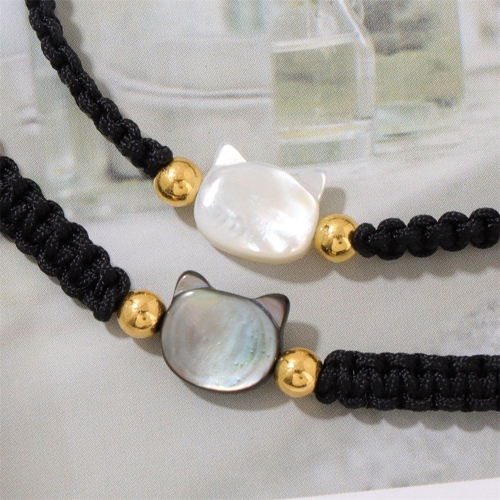 Hand-woven couple's bracelet with a cat-face design