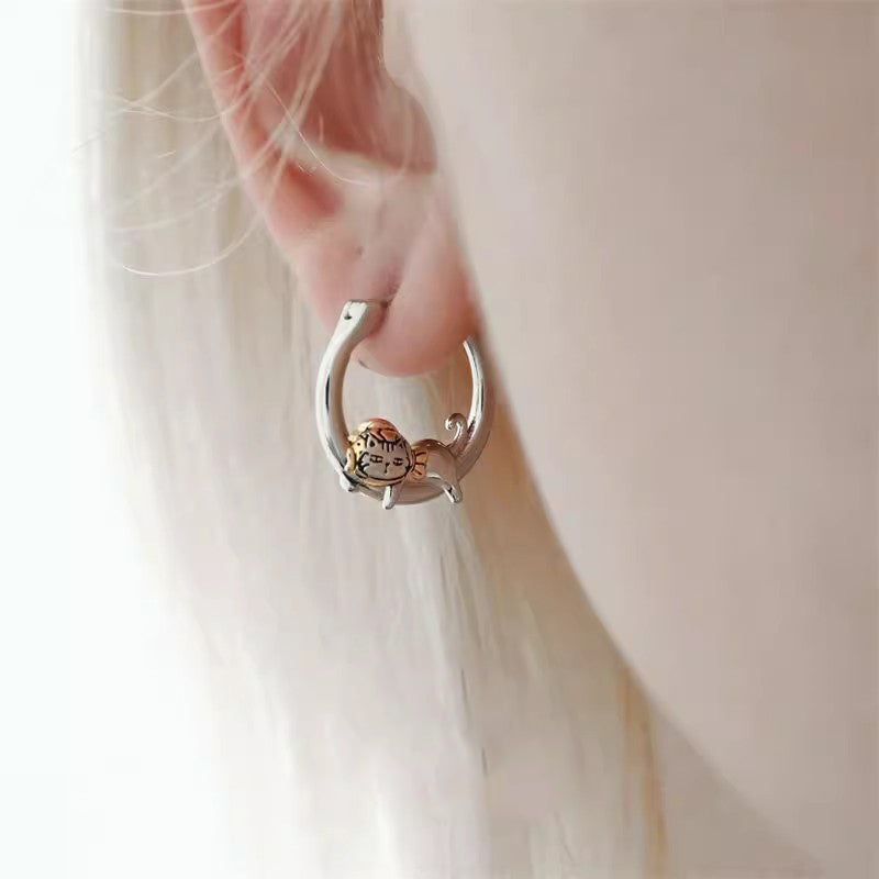 Stylish round cat-themed earrings