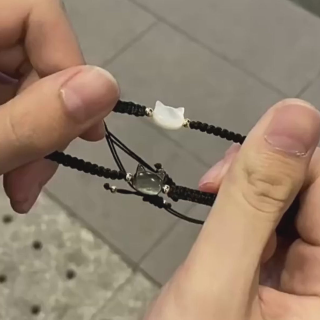 Hand-woven couple's bracelet with a cat-face design